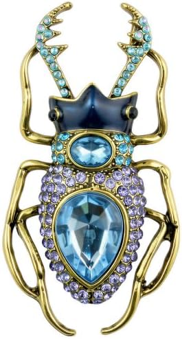 We set blue created rhinestones across a cast alloy beetle frame measuring 2.56 inches long for coat lapels and scarves.