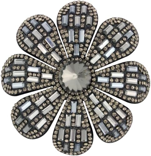 Layered gray fabric petals meet created glass crystals in a dual-mount pin and clip built for coats or hair.