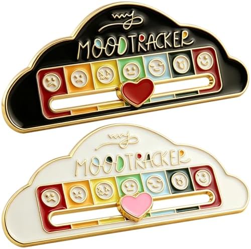 Two cloud-shaped alloy pins with sliding indicators in black and white enamel finishes.