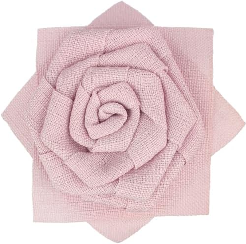 A soft pink fabric rose measuring 3.43 inches across, fitted with both a brooch pin and an alligator clip.