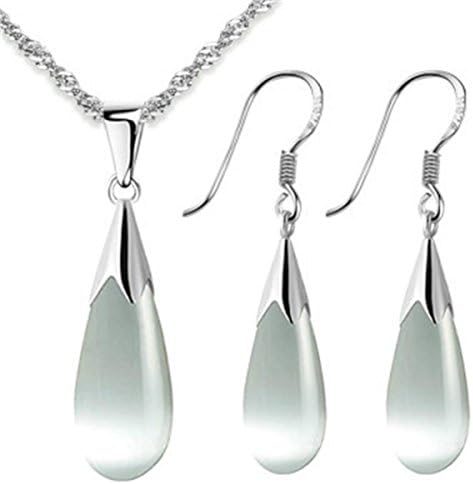 A teardrop pendant and matching drop earrings in 925 sterling silver with created cat eye stones and an 18 inch chain.