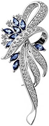 Faceted blue created crystals and simulated pearls form a curved leaf brooch sized at 2.5 inches for coats and knit shawls.