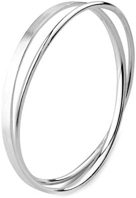 A solid 990 silver bangle pairing one polished strand with one textured strand in a twisted band measuring 2.36 inches across.