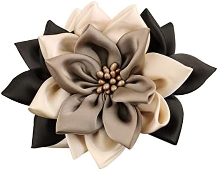 Fourteen teeth grip thick hair beneath layered fabric petals in quiet shades of black, beige and coffee.