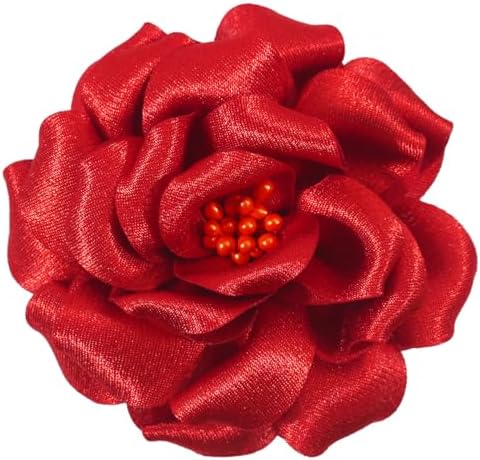 Red fabric camellia fitted with both a bar pin and an alligator clip on the back for wearing on cloth or in hair.