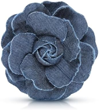 Layered fabric petals form a camellia rose measuring 2.6 inches across, built with a dual clip and pin back.