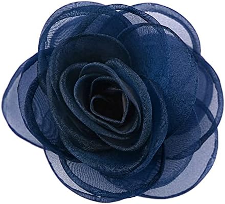 Layered blue fabric petals form this 4.3 inch rose, fitted with both an alligator hair clip and a brooch pin on the back.
