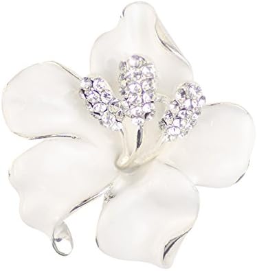 A white floral brooch shaped in alloy metal and set with faceted created glass crystals, weighing 29.8 grams.