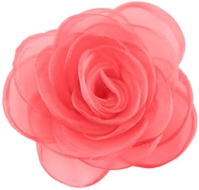 A four inch fabric rose mounted on an alloy base with both an alligator hair clip and a safety brooch pin.